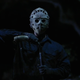 The faceless killer, grabbing his musket (Screenshot: IFC)